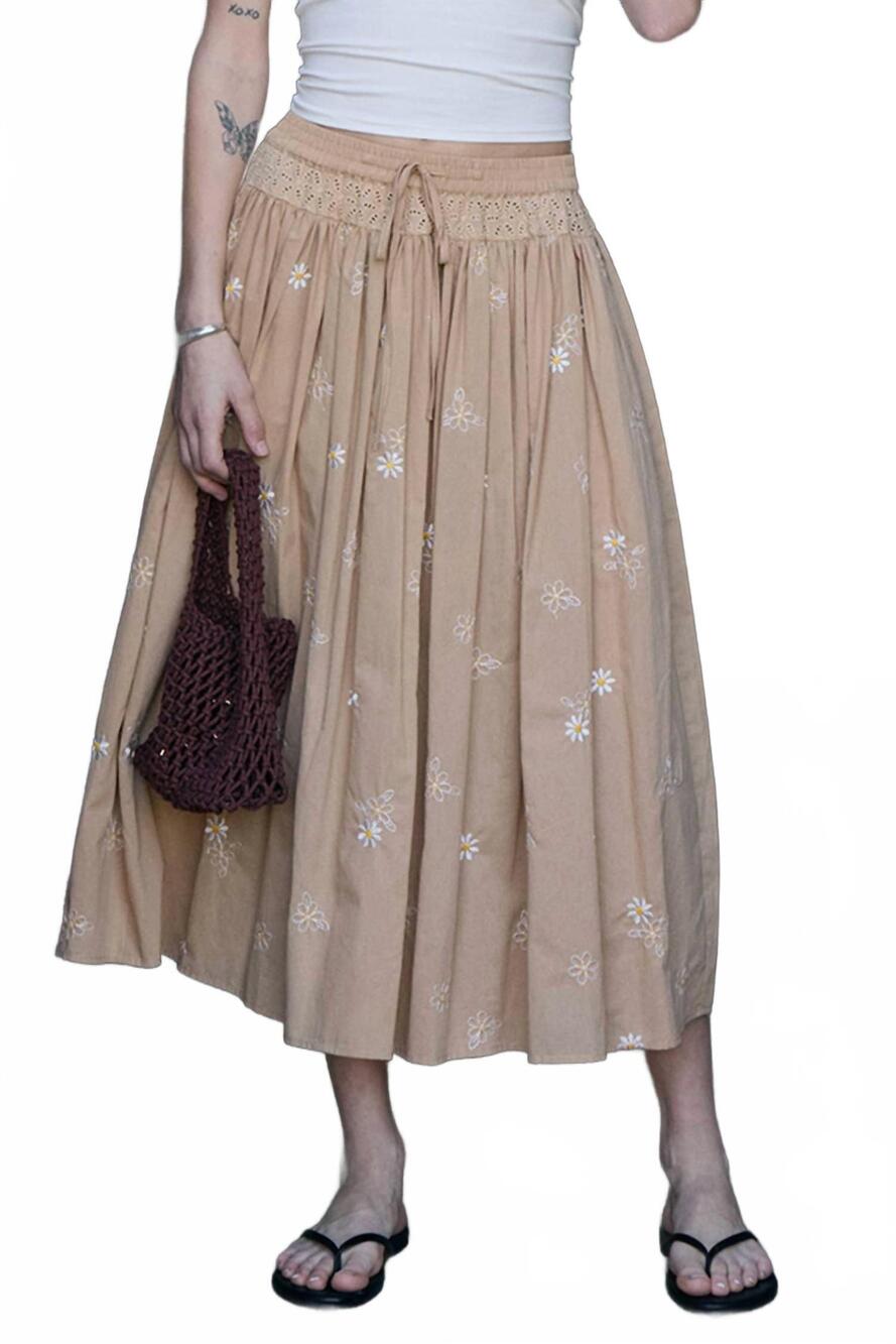 NEW RAISONNEL daisy embroidered smocked midi skirt in beige